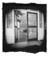 Black and white photo: Through Screen Doors&mdash;Lily Dale
